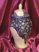 Saturn: cremation urns